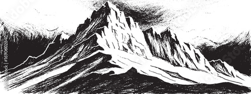Rugged mountain range with sharp peaks and deep shadows creating dramatic black and white wilderness scene