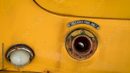 Fuel tank car with sign Unleaded fuel only premium ecology refueling retro cars