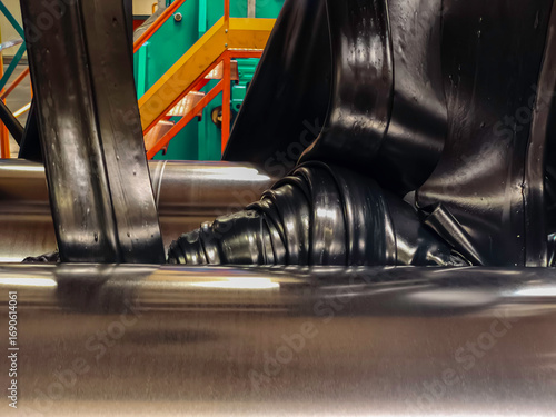 Rubber, oil and chemicals are mixed homogeneously on the rubber mixer. Rubber producing.