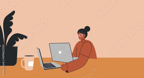 Focused professional woman efficiently manages tasks on two laptops at a clean desk, ideal for remote work, business, and online education concepts.