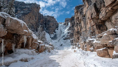Wallpaper Mural Majestic frozen waterfall in snowy canyon landscape Torontodigital.ca