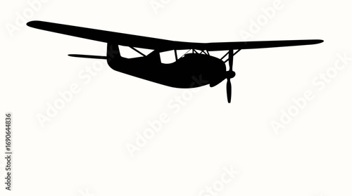 A vintage biplane in flight, depicted as a stark black silhouette against a white background.