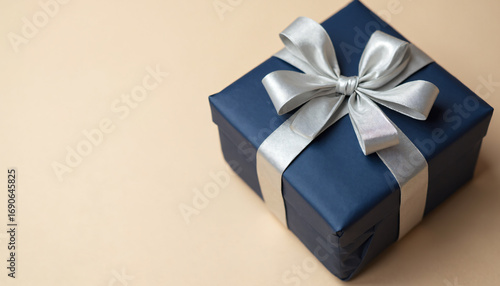Blue gift box with silver ribbon
