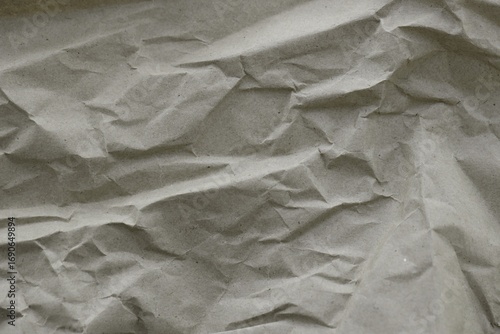 Brown crumpled recycled paper texture background. Kraft Paper