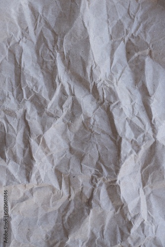 Brown crumpled recycled paper texture background. Kraft Paper
