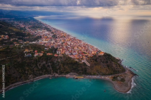 Capo d'Orlando in Italy, Sicily island during sunset. Capo d'Orlando is a community in the province of Messina, Sicily, Italy. August 2024. Aerial drone picture