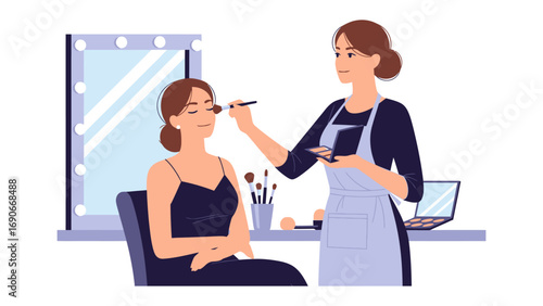 Professional makeup artist applying blush to a young woman s face in a well lit beauty studio with a mirror and laptop