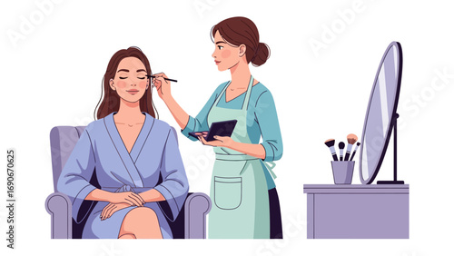 Professional makeup artist applying eyeshadow to a happy young woman sitting in a chair with a mirror and brushes nearby
