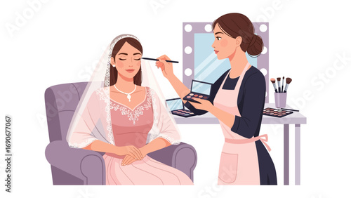 Professional makeup artist applying eyeshadow to a beautiful bride sitting in a chair with a wedding dress and veil