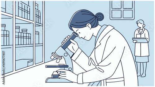 Scientists working in a laboratory using a microscope.