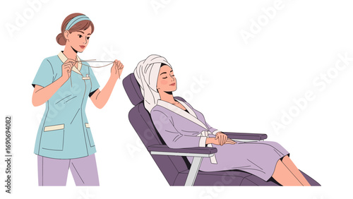Professional cosmetologist applying a hair treatment to a client relaxing in a salon chair with a towel wrapped around her head