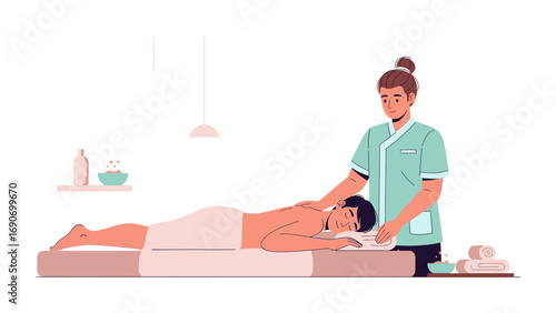 Professional masseuse giving a relaxing back massage to a client lying on a massage table in a spa setting