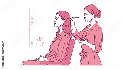 Young woman applying makeup to her friend s face while they relax in matching pink robes at home