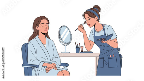 Young woman receiving professional makeup application from a skilled artist in a bright clean studio setting