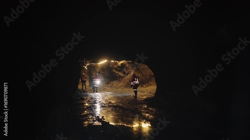 Miners inspect the mine