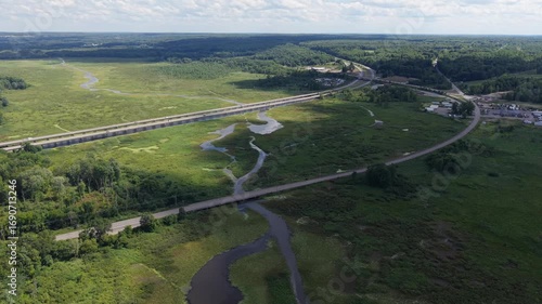 aerial view of highway crossing a swamp
