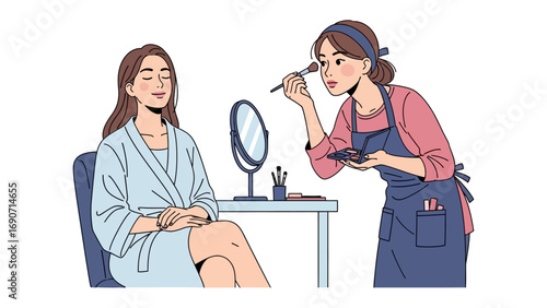 Professional makeup artist applying cosmetic makeup to a smiling woman in a spa robe with a mirror and products on a table