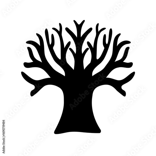 Silhouette of a bare tree with spreading branches against a white background