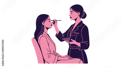 Professional makeup artist applying eye shadow to a young woman sitting in a chair wearing a robe in a studio setting