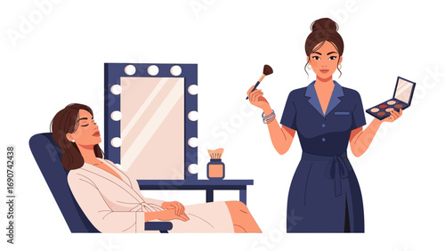 Professional makeup artist applying cosmetics to a client relaxing in a chair in front of a lighted vanity mirror