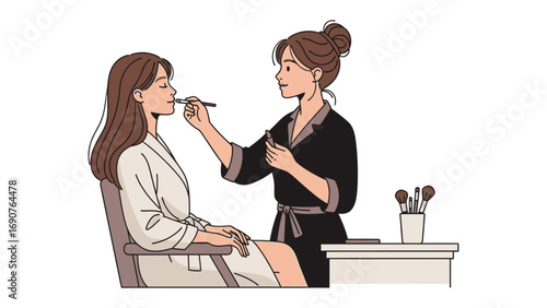 Professional makeup artist applying cosmetic makeup to a young woman s face with a brush in a beauty salon setting
