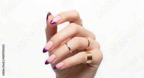 Elegant Hand with a Modern Purple French Manicure and Minimalist Gold Rings.