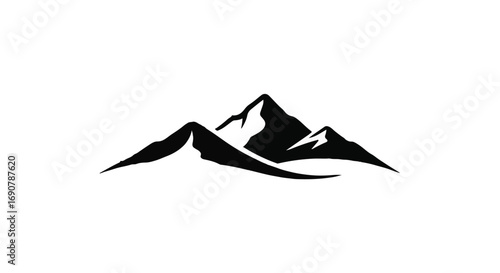 Majestic mountain peaks silhouetted against a clear sky, symbolizing adventure and nature's grandeur.