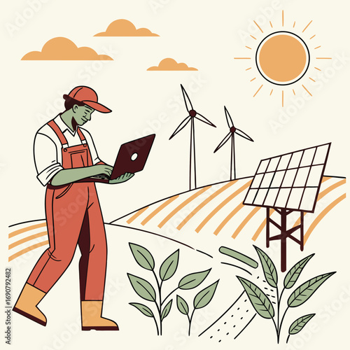 Farmer in orange overalls uses laptop near wind turbines under the sunlit sky
