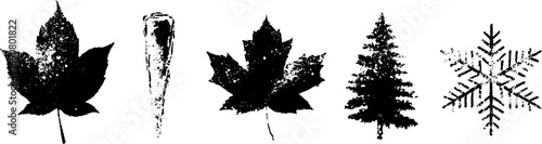 Grunge black and white nature set featuring leaves, tree, and snowflake silhouettes for urban design