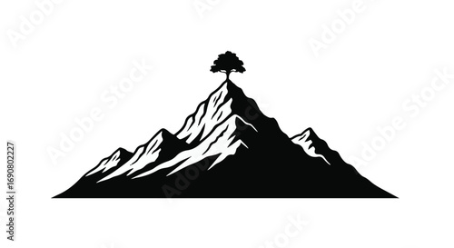 Lone tree stands strong atop a majestic mountain peak, symbolizing resilience and achievement.