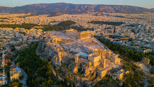 Fototapeta Naklejka Na Ścianę i Meble -  Aerial view around the capitol city Athens and the acropolis in Greece on an early sunny morning in fall.