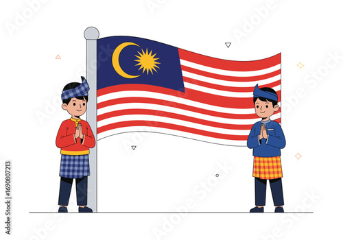 Two malaysian children in traditional attire stand in front of a waving malaysian flag