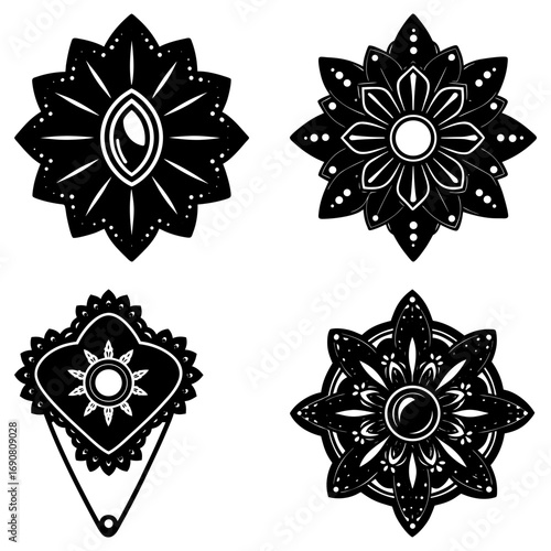 Four floral designs in black and white with jewelry and pin elements in a symmetrical arrangement