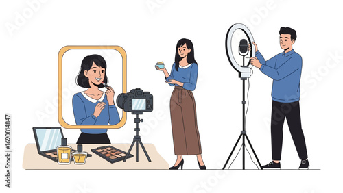Young woman applying makeup in a mirror while a cameraman sets up lighting for a video recording session