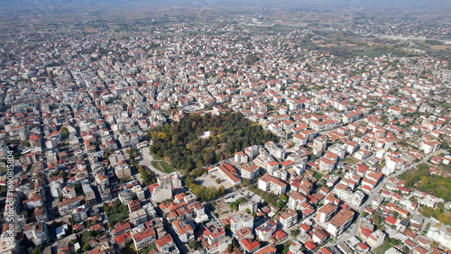 Fototapeta Naklejka Na Ścianę i Meble -  Aerial view of the city Karditsa in Greece on a cloudy day in afternoon