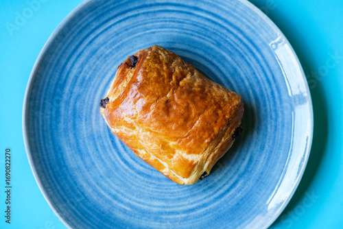 Single Pain Au Chocolate Breakfast Danish Pastry Served On A Plate