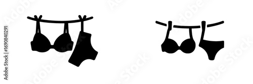 Lingerie icon set with bra and panties hanging on a clothesline, black silhouette of female underwear for laundry or fashion concepts