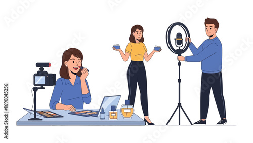 Young woman applying makeup while recording a beauty tutorial video with a ring light and camera setup for online streaming and content creation