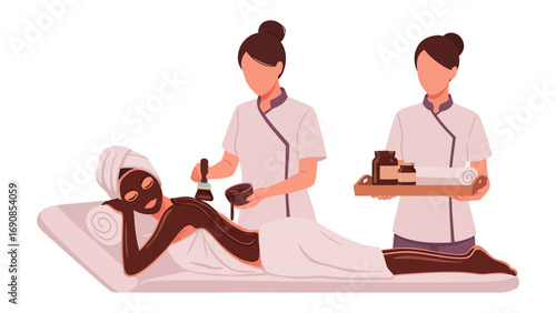 Two beauticians applying facial mask and performing skincare treatment on a woman lying on a spa bed