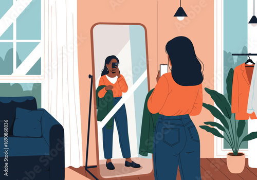 Young woman trying on clothes in front of a mirror in a stylish room