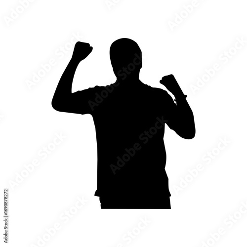 Silhouetted man celebrating with raised arms