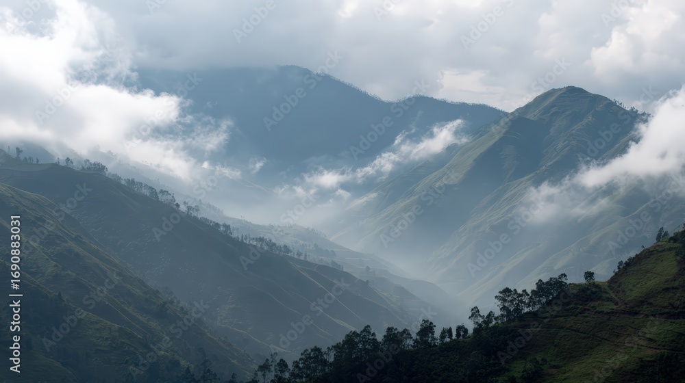 Fototapeta premium Stunning mountain landscape with mist and rolling hills for nature enthusiasts