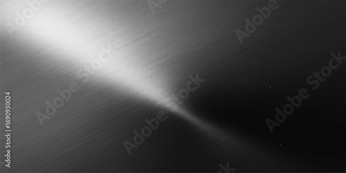 A textured metallic background with a brushed finish reflects light on a sleek, gray steel surface