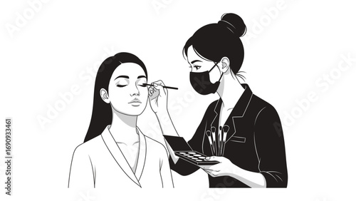 Professional makeup artist wearing a mask applies eyeshadow to a client with closed eyes in a studio setting with a white background
