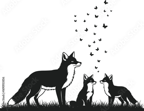Family of Fox Silhouettes in Grass Vector Design
