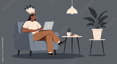 Focused individual in a feathered headdress works remotely on a laptop from a cozy armchair. Depicts modern work, lifestyle, and digital flexibility.