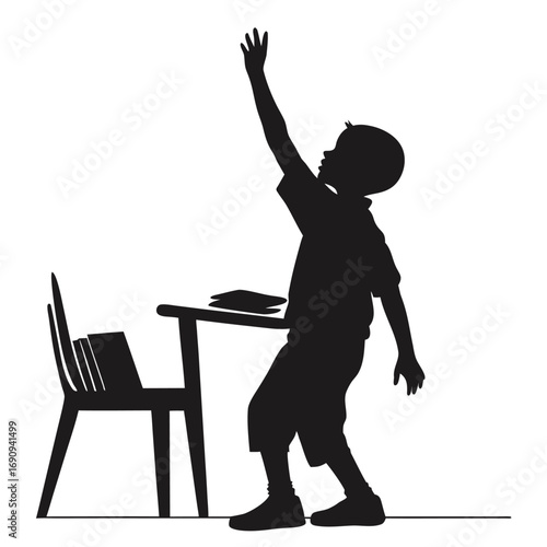 Boy raising hand in class