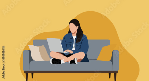 Young woman comfortably using a laptop on a couch at home, ideal for remote work, online education, or modern digital lifestyle concepts.