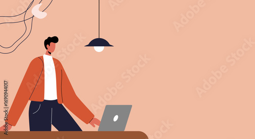 Young man working remotely on his laptop in a modern, minimalist setting. Depicts remote work, online education, or a digital lifestyle.