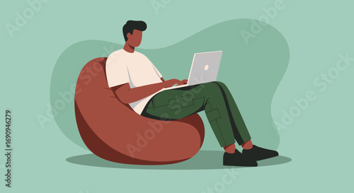 Person works or studies remotely on a laptop, comfortably seated on a bean bag. Perfect for flexible work, online learning, or modern digital lifestyle concepts.